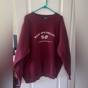Rose Apothecary (Schitt’s Creek) Graphic Crewneck Sweatshirt -Merlot Unisex XXL